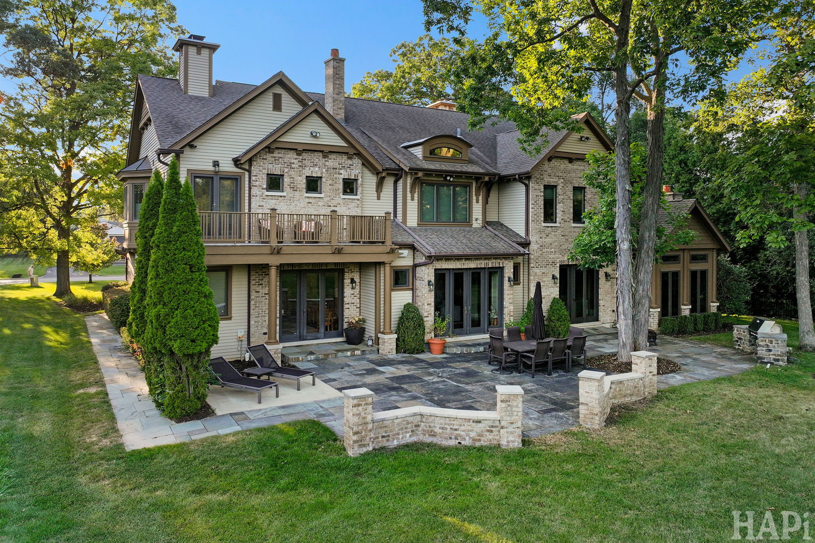 1425 Lee Road Northbrook, IL 60062 - Photo 51 of 53 a front view of a house with a yard table and chairs