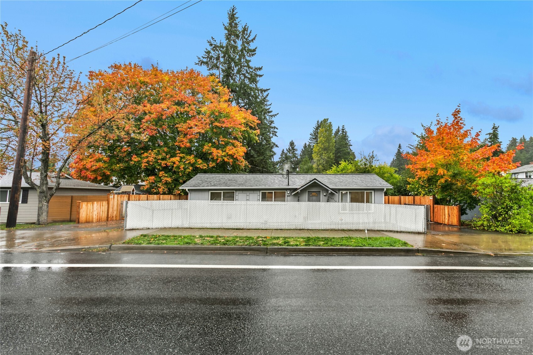 15914 52nd Avenue West Edmonds, WA 98026 - Photo 1 of 29 a front view of a house with a garden and tree