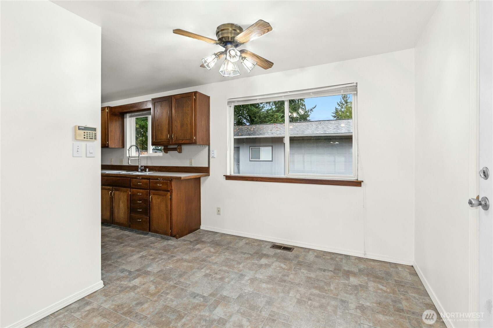 15914 52nd Avenue West Edmonds, WA 98026 - Photo 17 of 29 a view of kitchen with cabinets stove and a window