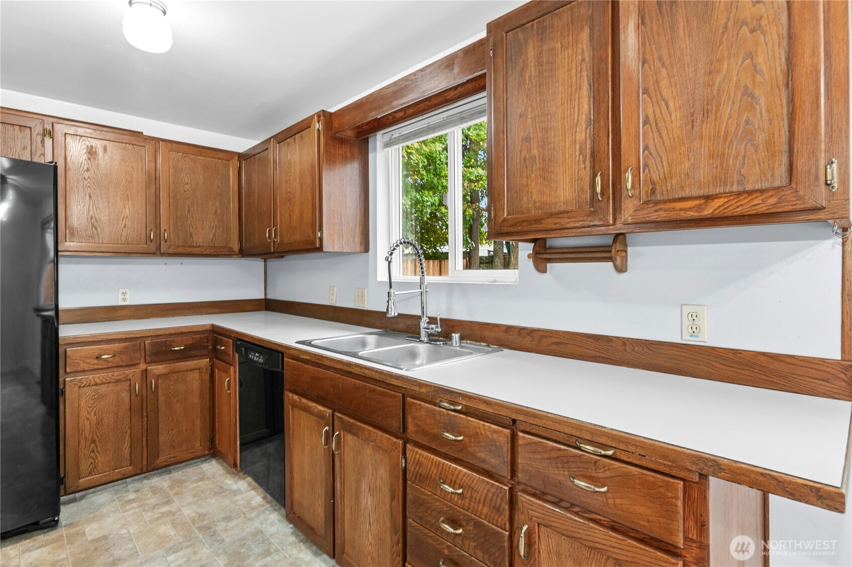 15914 52nd Avenue West Edmonds, WA 98026 - Photo 18 of 29 a kitchen with a sink cabinets and window