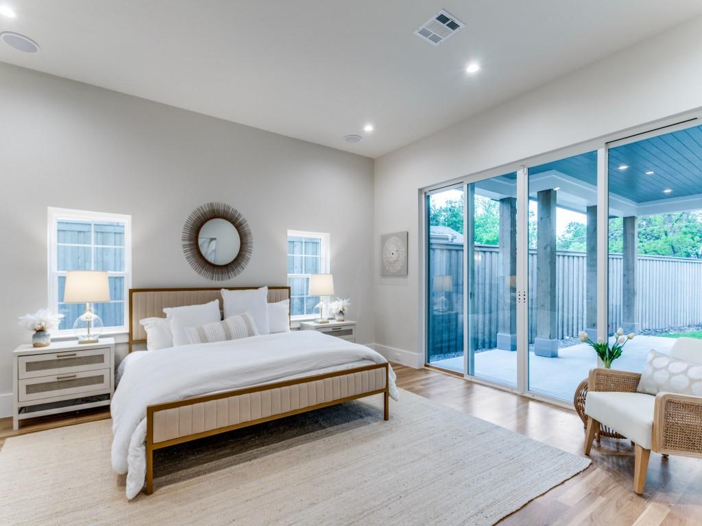 3911 Hawick Lane Dallas, TX 75220 - Photo 12 of 23 a bedroom with a bed and window
