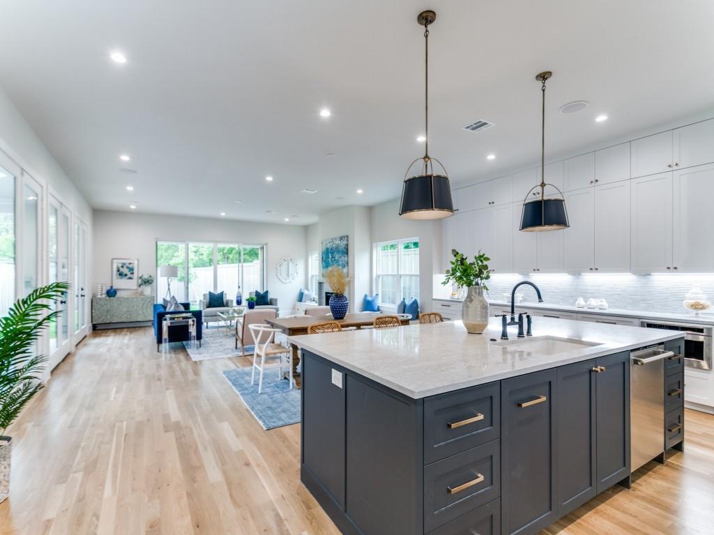 3911 Hawick Lane Dallas, TX 75220 - Photo 7 of 23 a kitchen with a sink stove and wooden floor