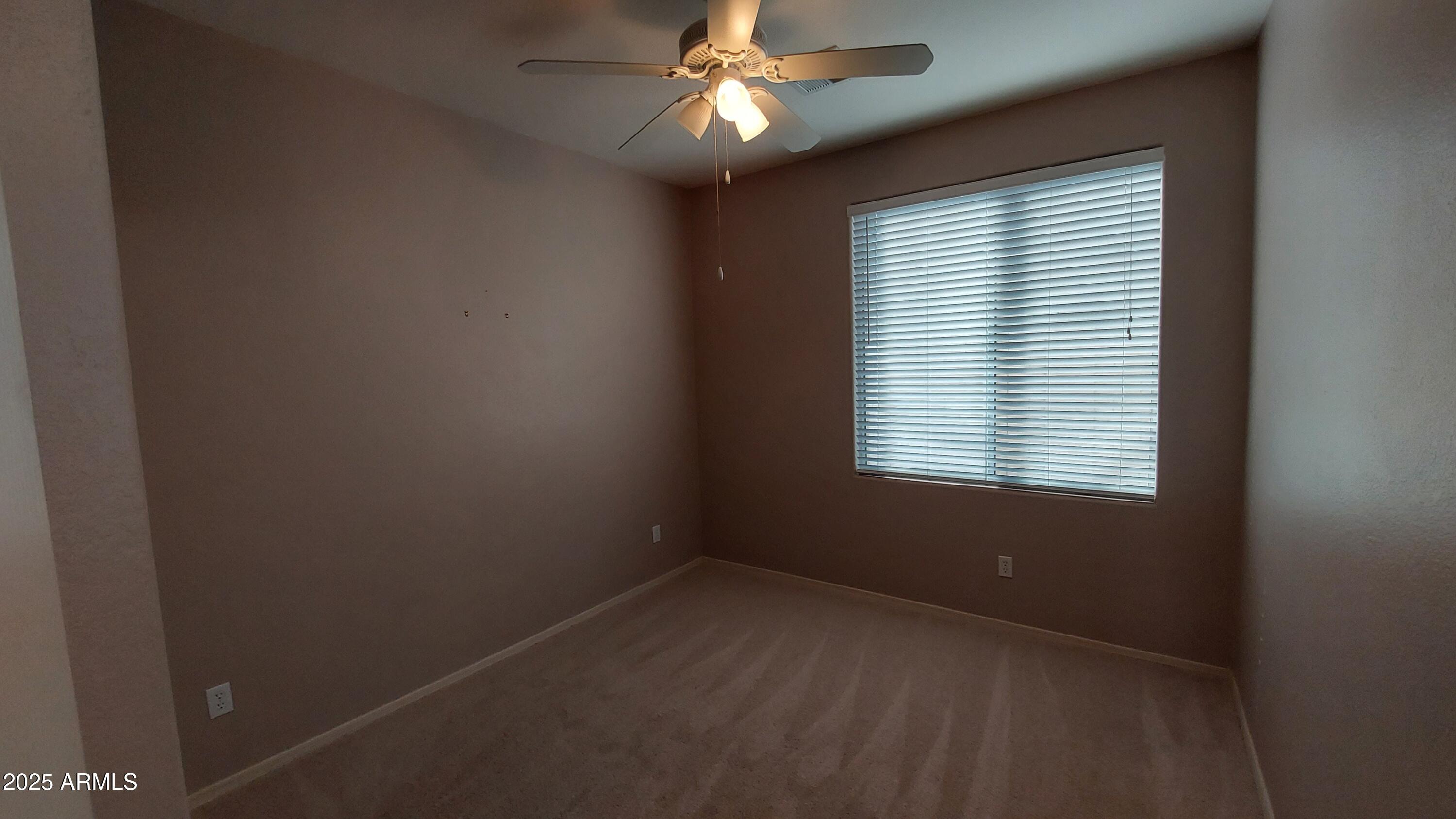 740 North Nantucket Street Chandler, AZ 85225 - Photo 7 of 13 an empty room with a window