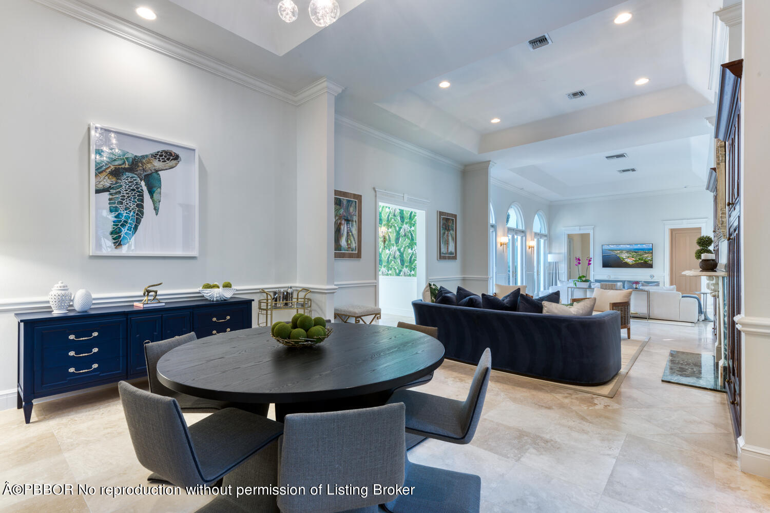 2258 Ibis Isle Road East Palm Beach, FL 33480 - Photo 12 of 31 a living room with furniture and a dining table