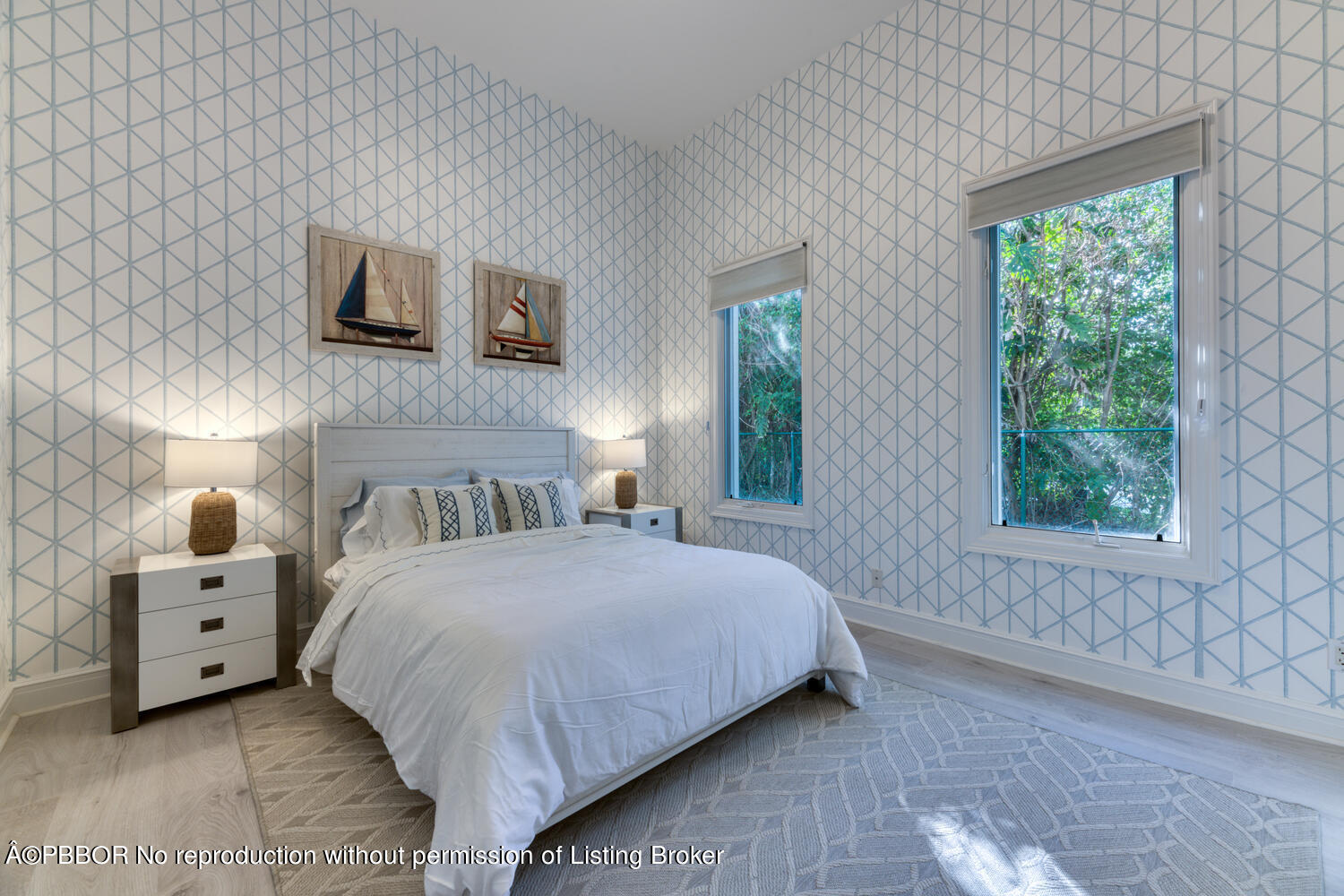 2258 Ibis Isle Road East Palm Beach, FL 33480 - Photo 24 of 31 a bedroom with a bed and a window