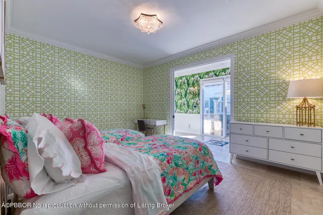 a bedroom with a bed and a baby crib