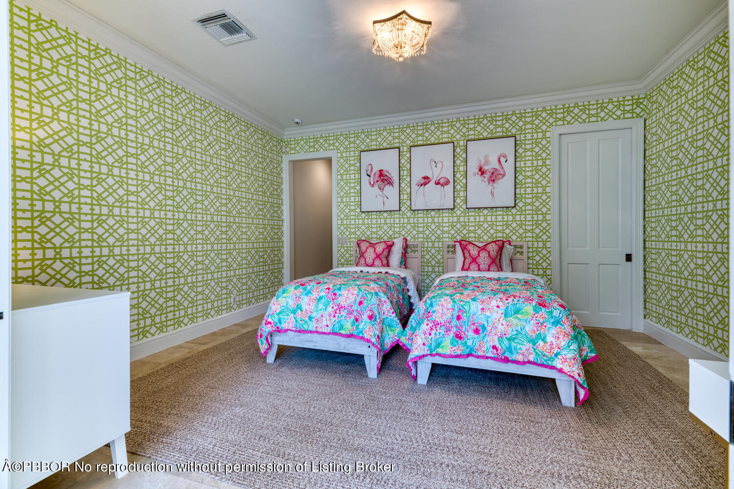 2258 Ibis Isle Road East Palm Beach, FL 33480 - Photo 27 of 31 a bedroom with a bed and a baby crib