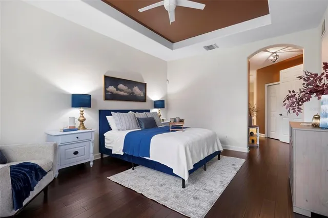 an aerial view of multiple houses with yard