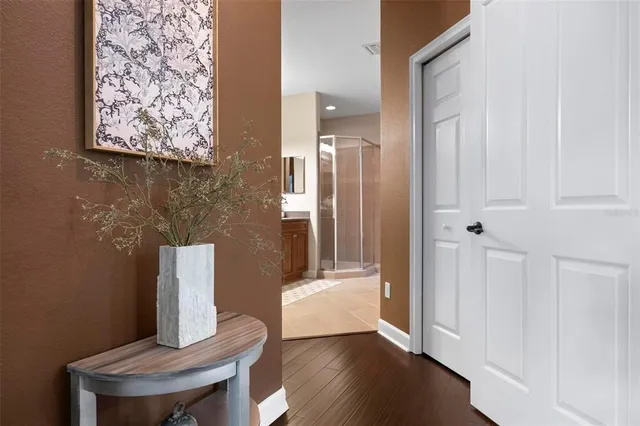 an aerial view of a house with garden space and street view