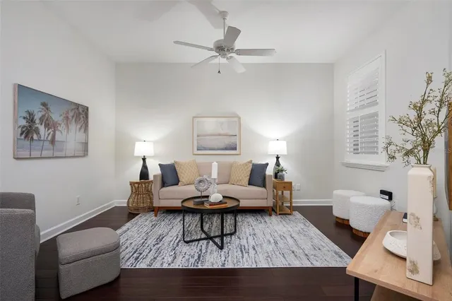 a living room with furniture and a table