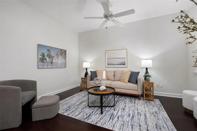 a living room with furniture and a table