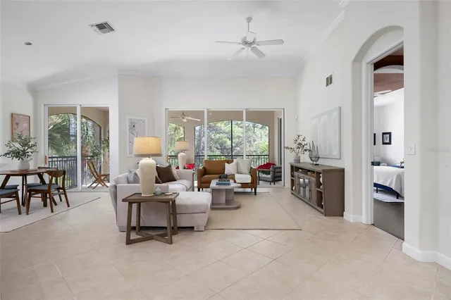 a living room with furniture and a window