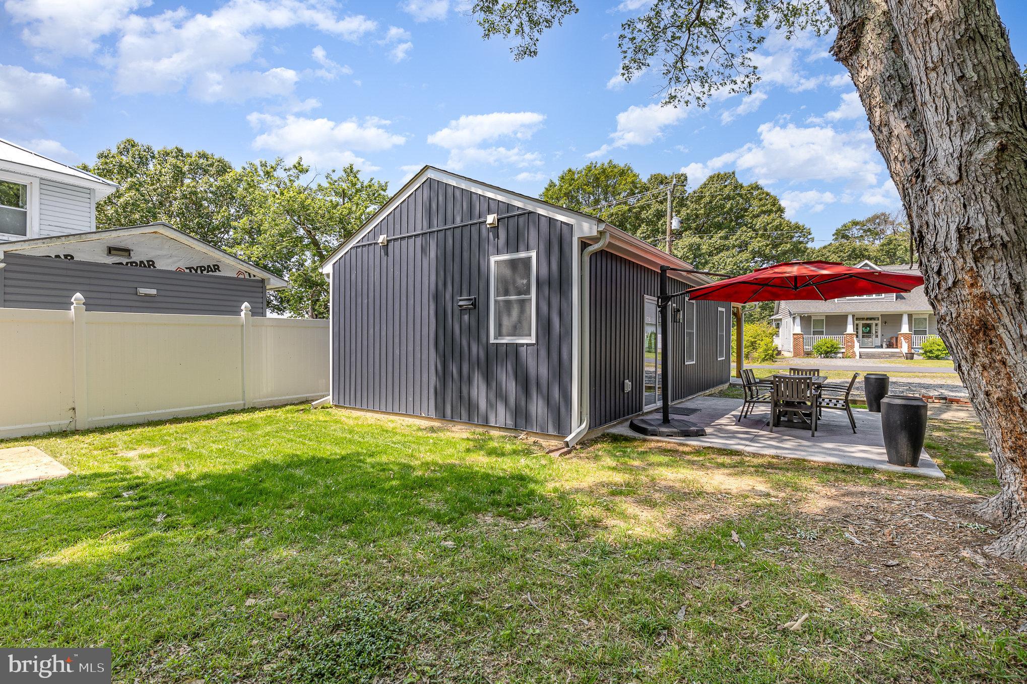 530 Monroe Bay Avenue Colonial Beach, VA 22443 - Photo 15 of 33 a view of a house with backyard porch and sitting area