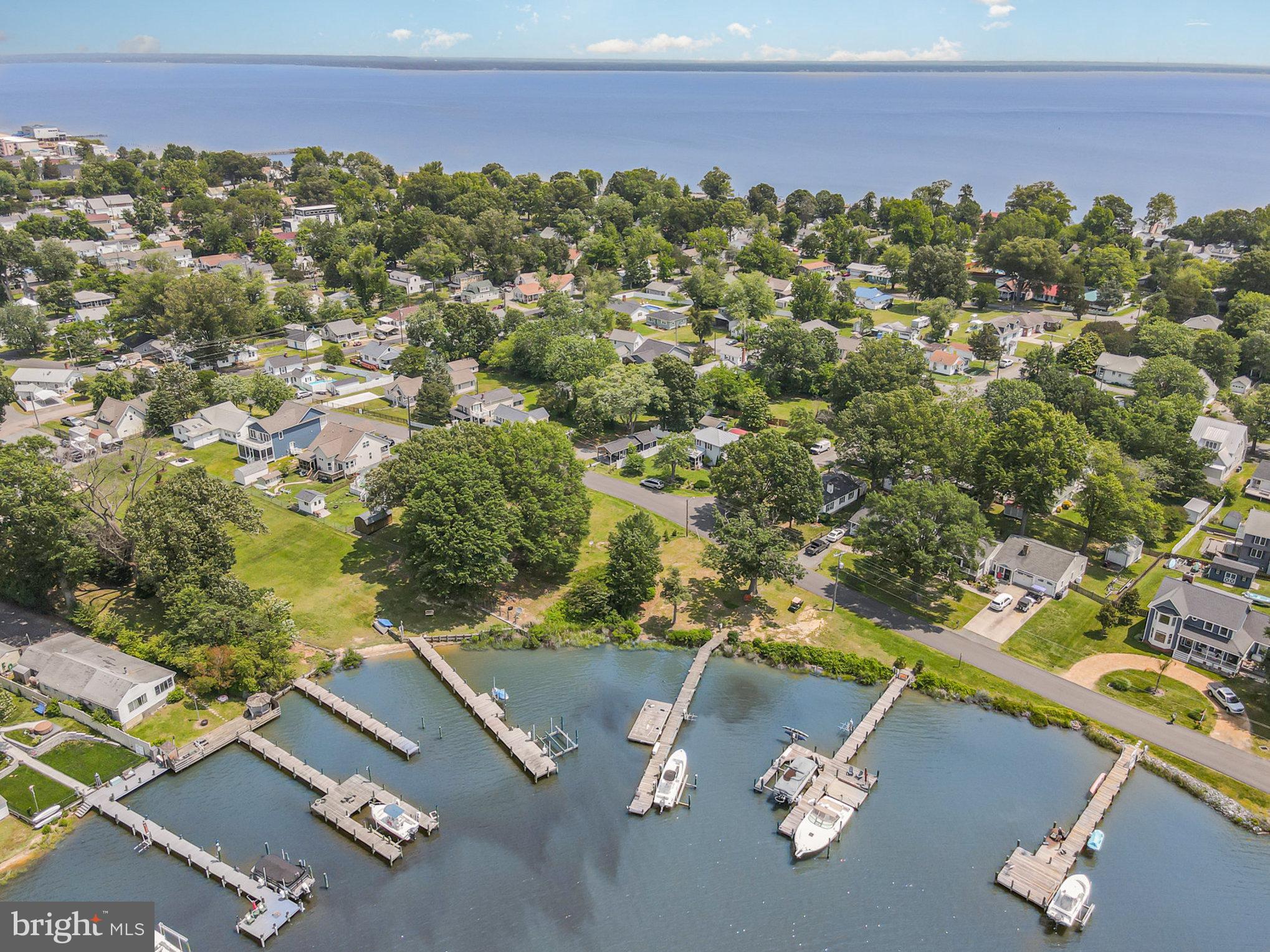 530 Monroe Bay Avenue Colonial Beach, VA 22443 - Photo 18 of 33 an aerial view of a house with a yard basket ball court and outdoor seating