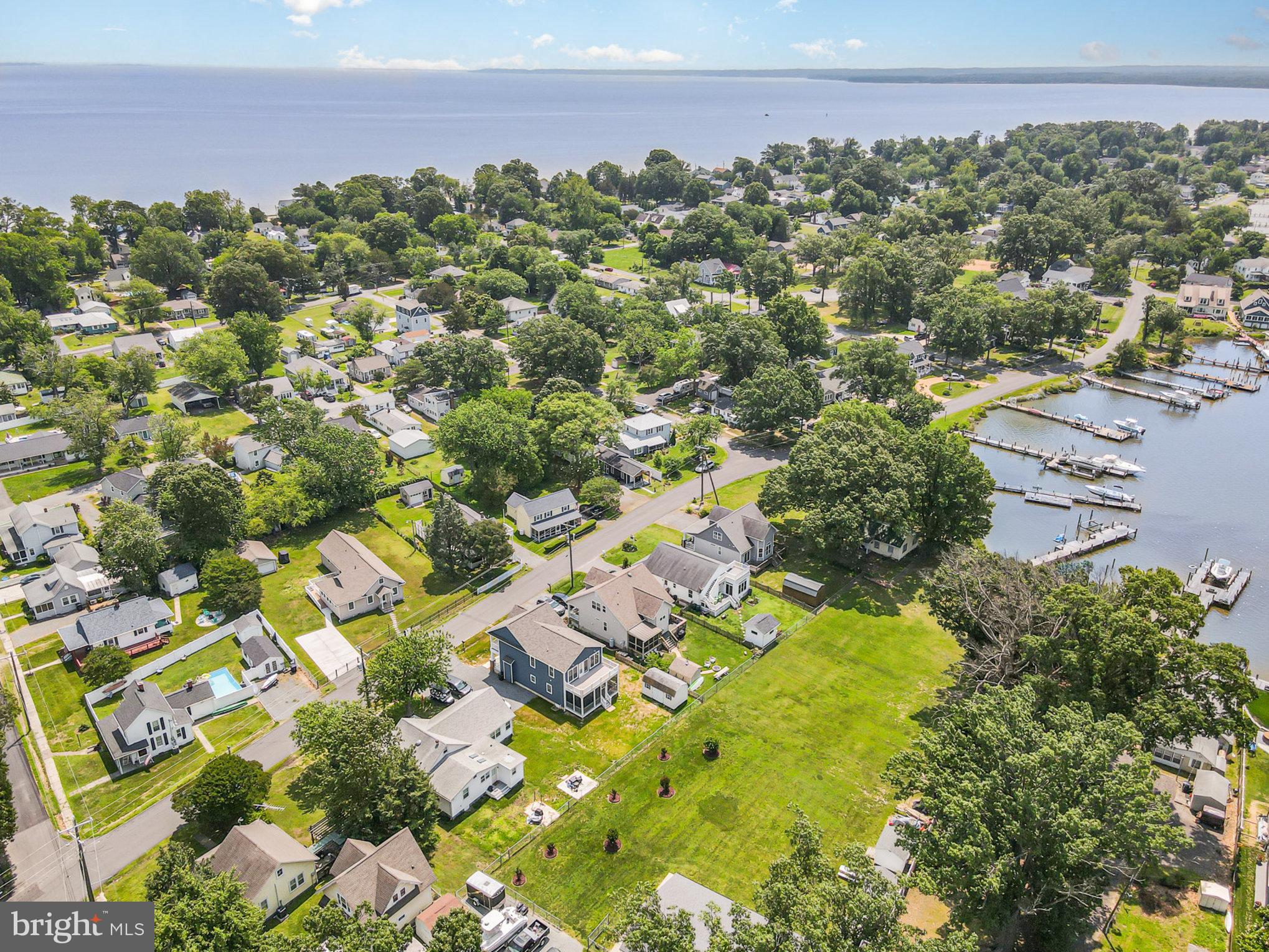530 Monroe Bay Avenue Colonial Beach, VA 22443 - Photo 19 of 33 a view of a city with lush green forest