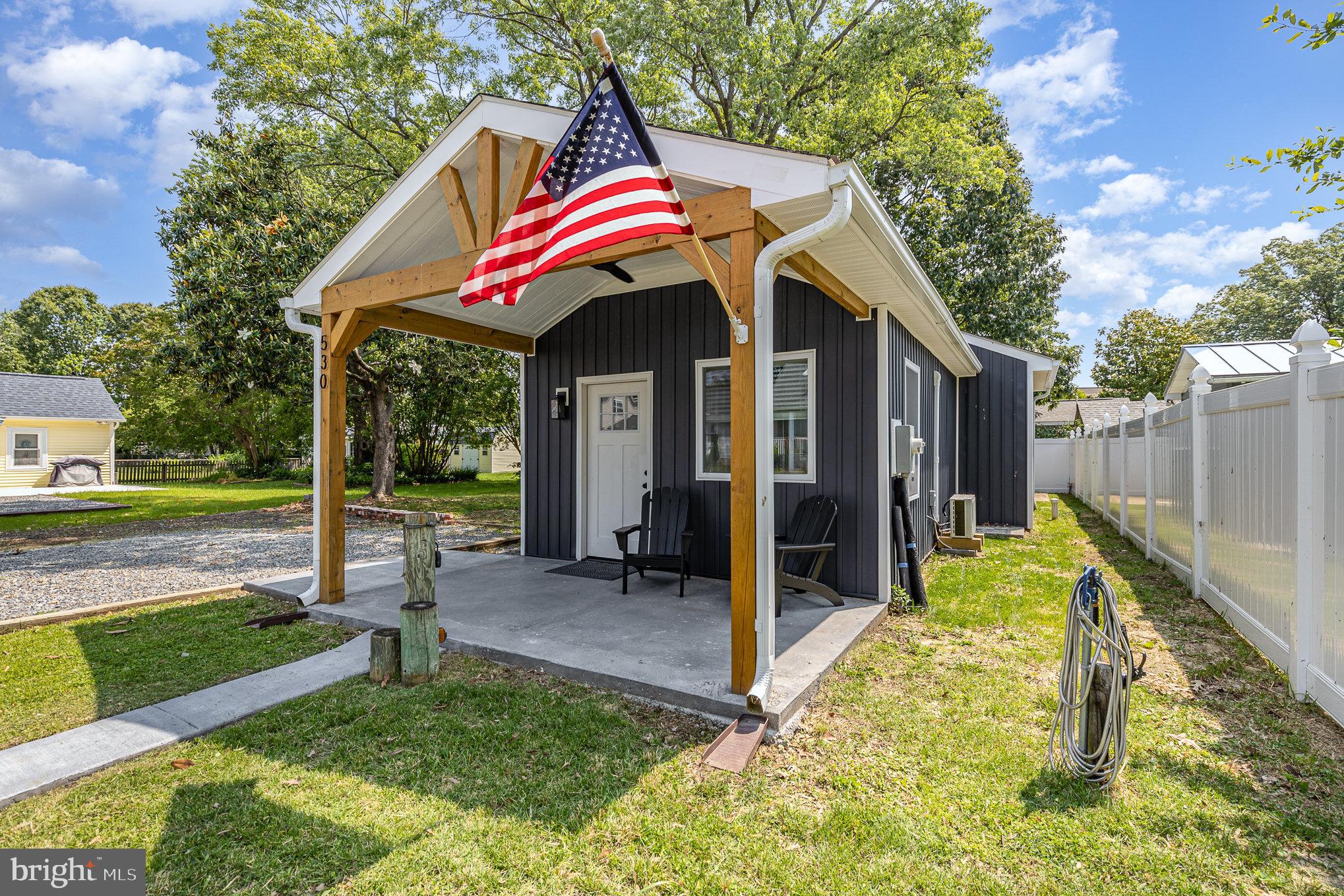 530 Monroe Bay Avenue Colonial Beach, VA 22443 - Photo 3 of 33 a view of small house with backyard