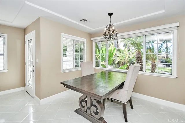 a view of a backyard with swimming pool