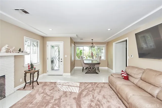 a view of a swimming pool with a table and chairs