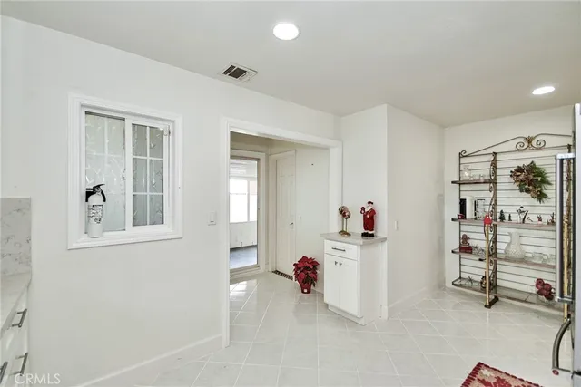 aerial view of a house with a yard basket ball court