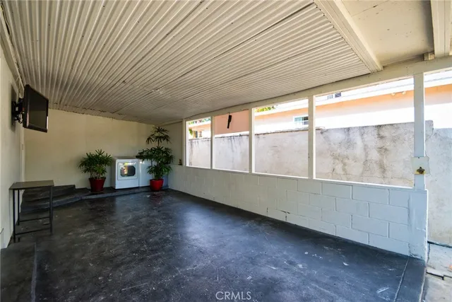 an aerial view of multiple houses with yard