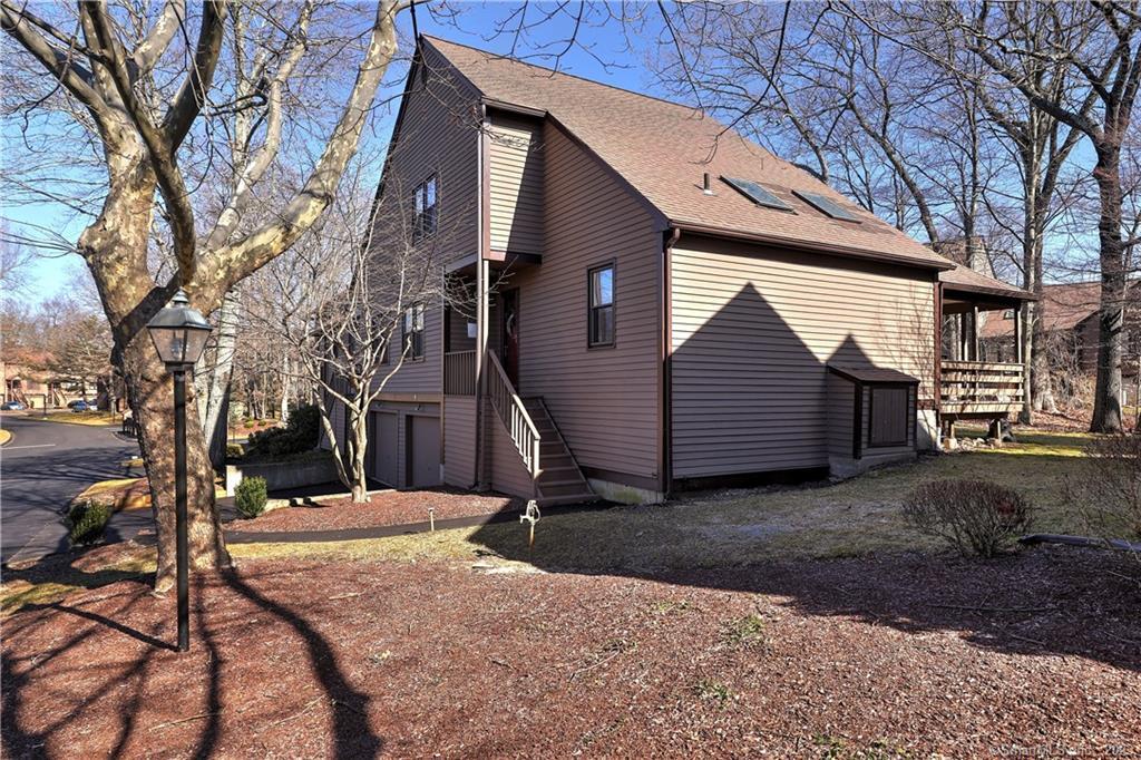 9 Boulder Ridge Road, Unit MONROE Monroe, CT 06468 - Photo 1 of 1 a backyard of a house