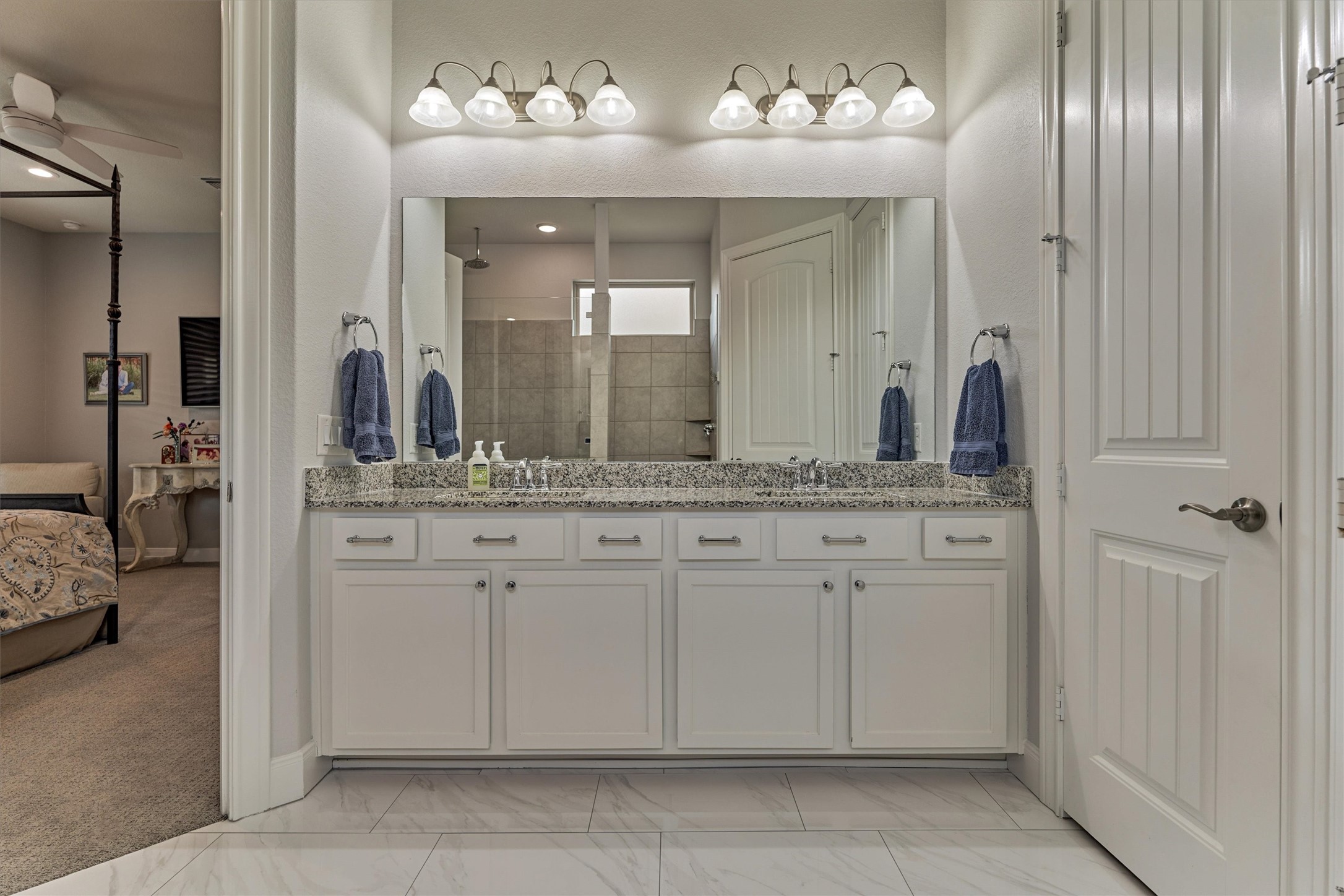108 Wild Wick Way Spring, TX 77382 - Photo 25 of 44 The Spa-Like Primary Bath Features Repainted Cabinets, A Granite Countertop, And Dual Sinks.