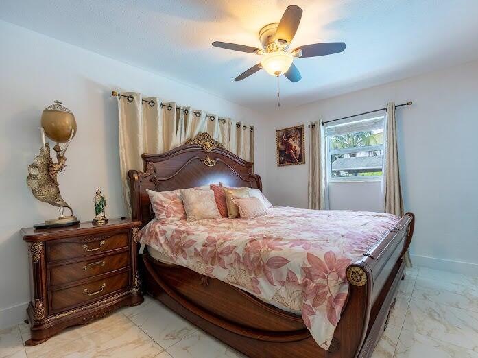253 Davis Road Palm Springs, FL 33461 - Photo 9 of 21 Master bedroom