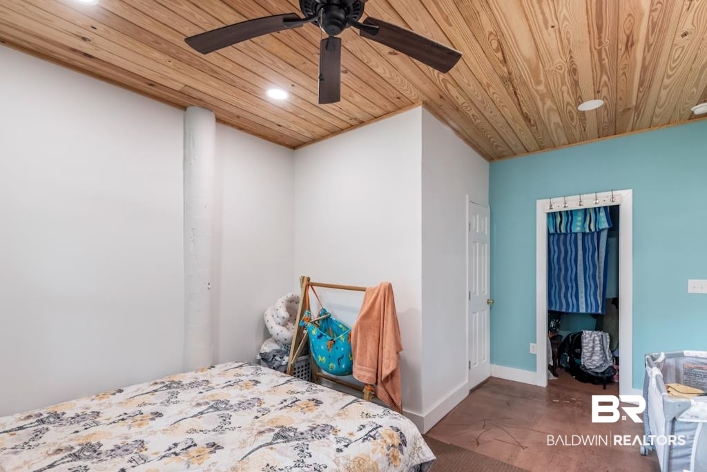 13742 Roberts Road Loxley, AL 36551 - Photo 9 of 18 Bedroom featuring baseboards, wood ceiling, recessed lighting, and a ceiling fan