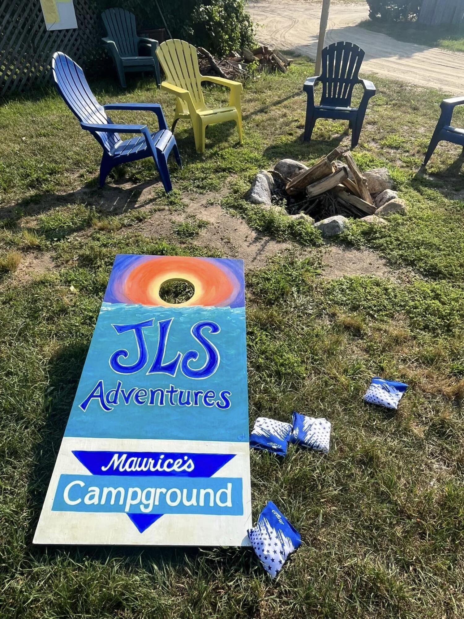 80 Route 6 Wellfleet, MA 02667 - Photo 19 of 23 a sign that is sitting on a rock