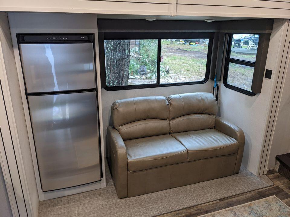 80 Route 6 Wellfleet, MA 02667 - Photo 6 of 23 a living room with furniture and a window
