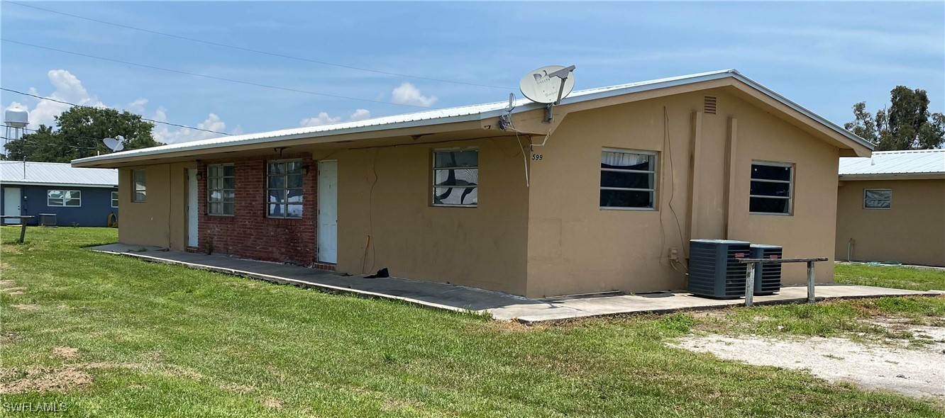 a front view of house with yard