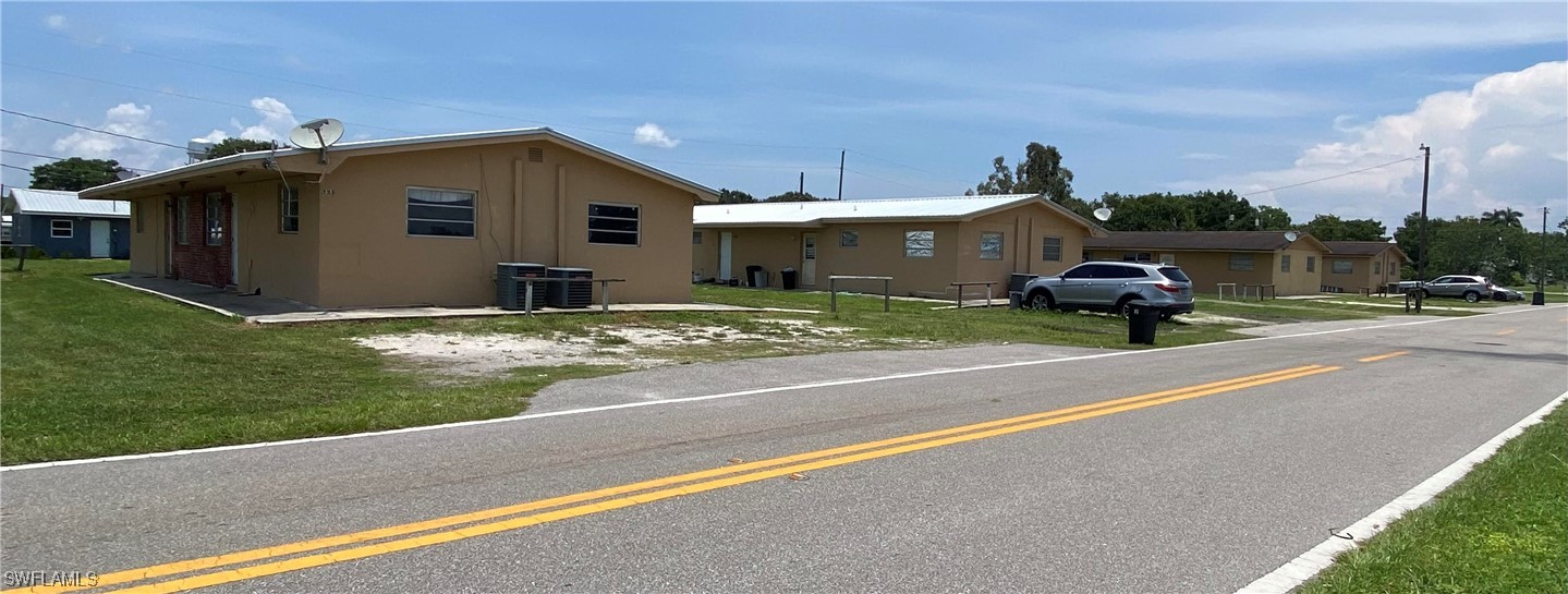 599 Avenue R Moore Haven, FL 33471 - Photo 2 of 23 a view of back yard of the house