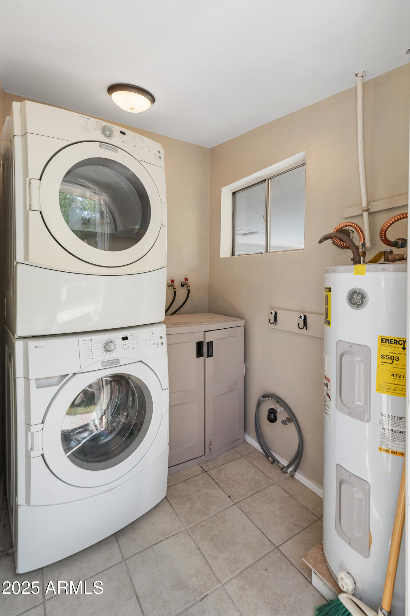 1407 East Mountain View Road Phoenix, AZ 85020 - Photo 22 of 35 a utility room with dryer and washer