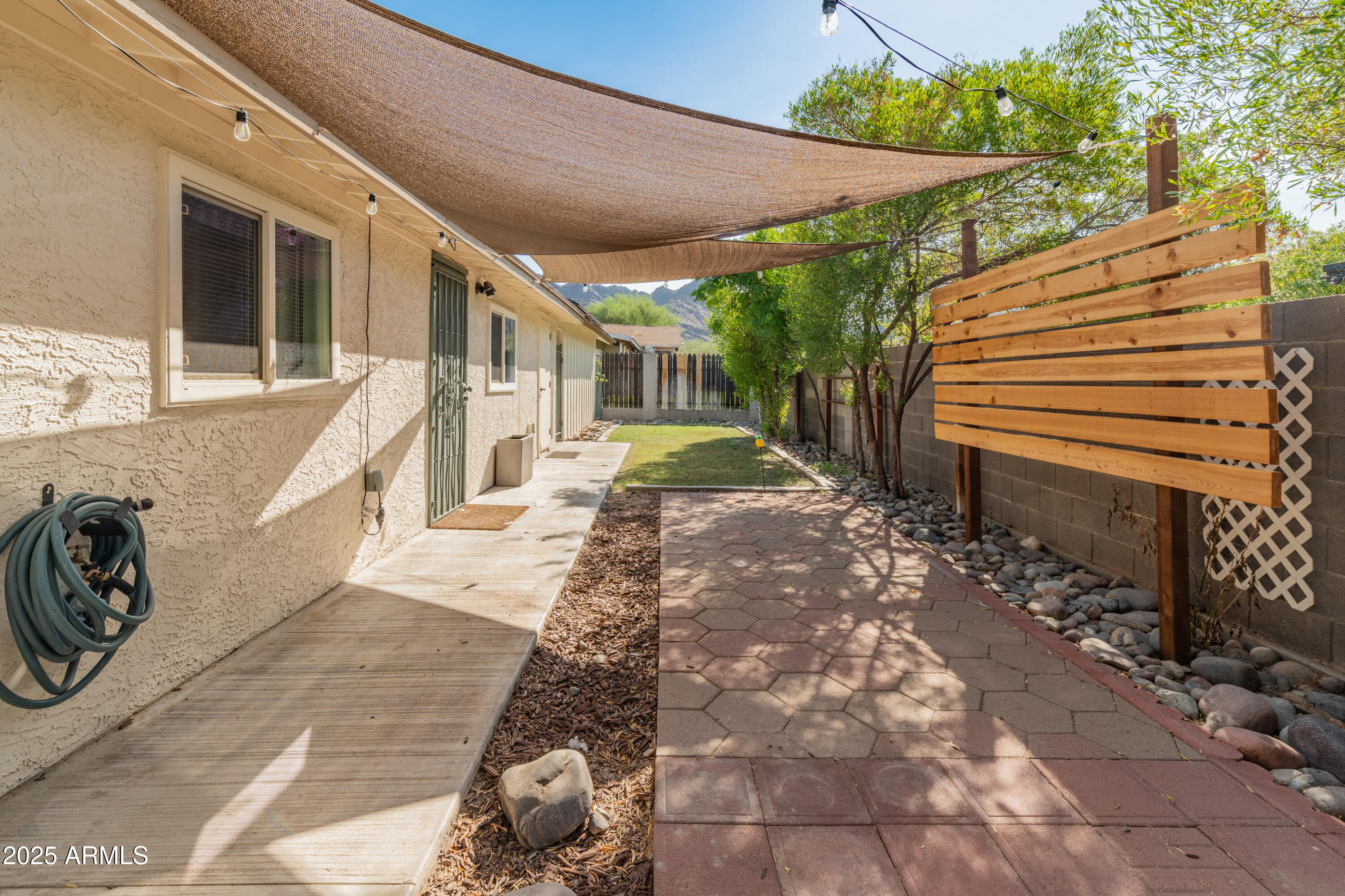 1407 East Mountain View Road Phoenix, AZ 85020 - Photo 25 of 35 a view of a backyard with sitting area