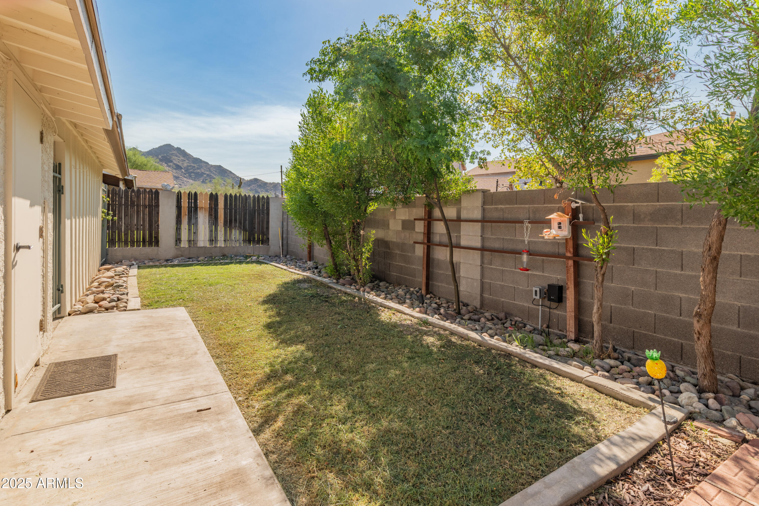 1407 East Mountain View Road Phoenix, AZ 85020 - Photo 28 of 35 a view of a house with a backyard