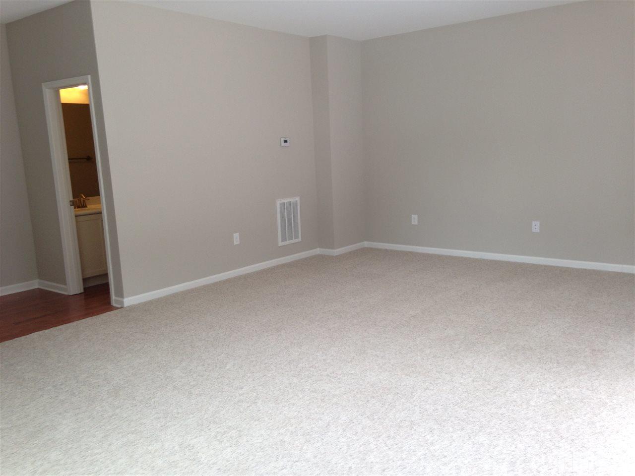 604 Edgewater Ridge Court Apex, NC 27523 - Photo 13 of 20 a view of an empty room