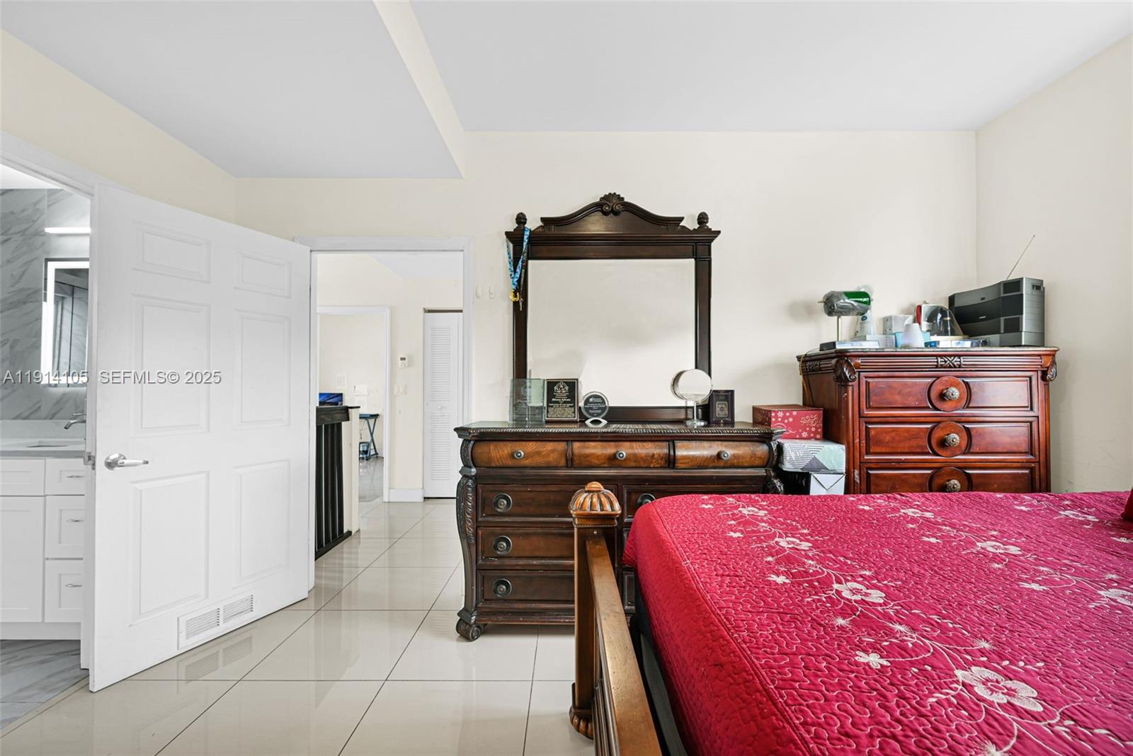 26100 Southwest 134th Place Homestead, FL 33032 - Photo 20 of 39 a bedroom with a bed and furniture