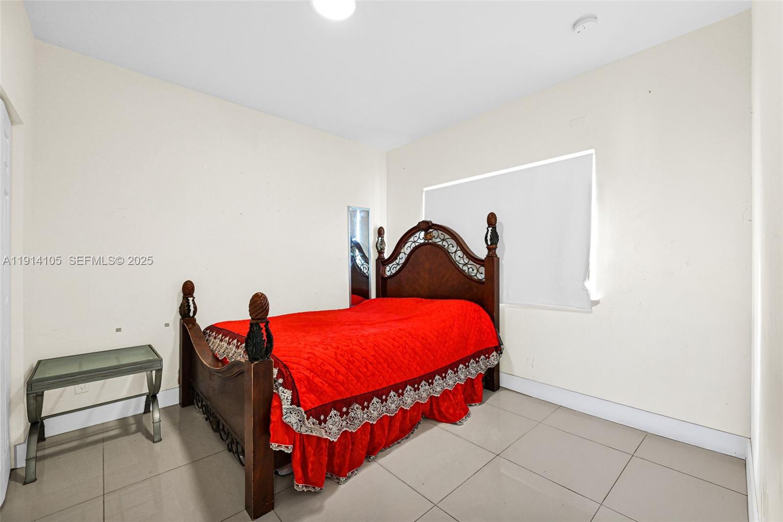 26100 Southwest 134th Place Homestead, FL 33032 - Photo 23 of 39 a bedroom with a bed and a dresser