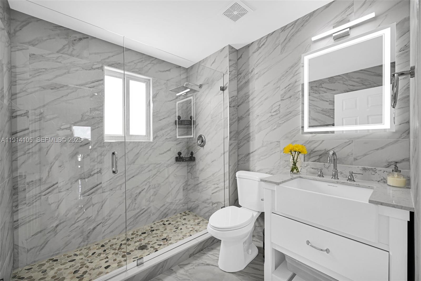 26100 Southwest 134th Place Homestead, FL 33032 - Photo 25 of 39 a bathroom with a sink toilet and shower