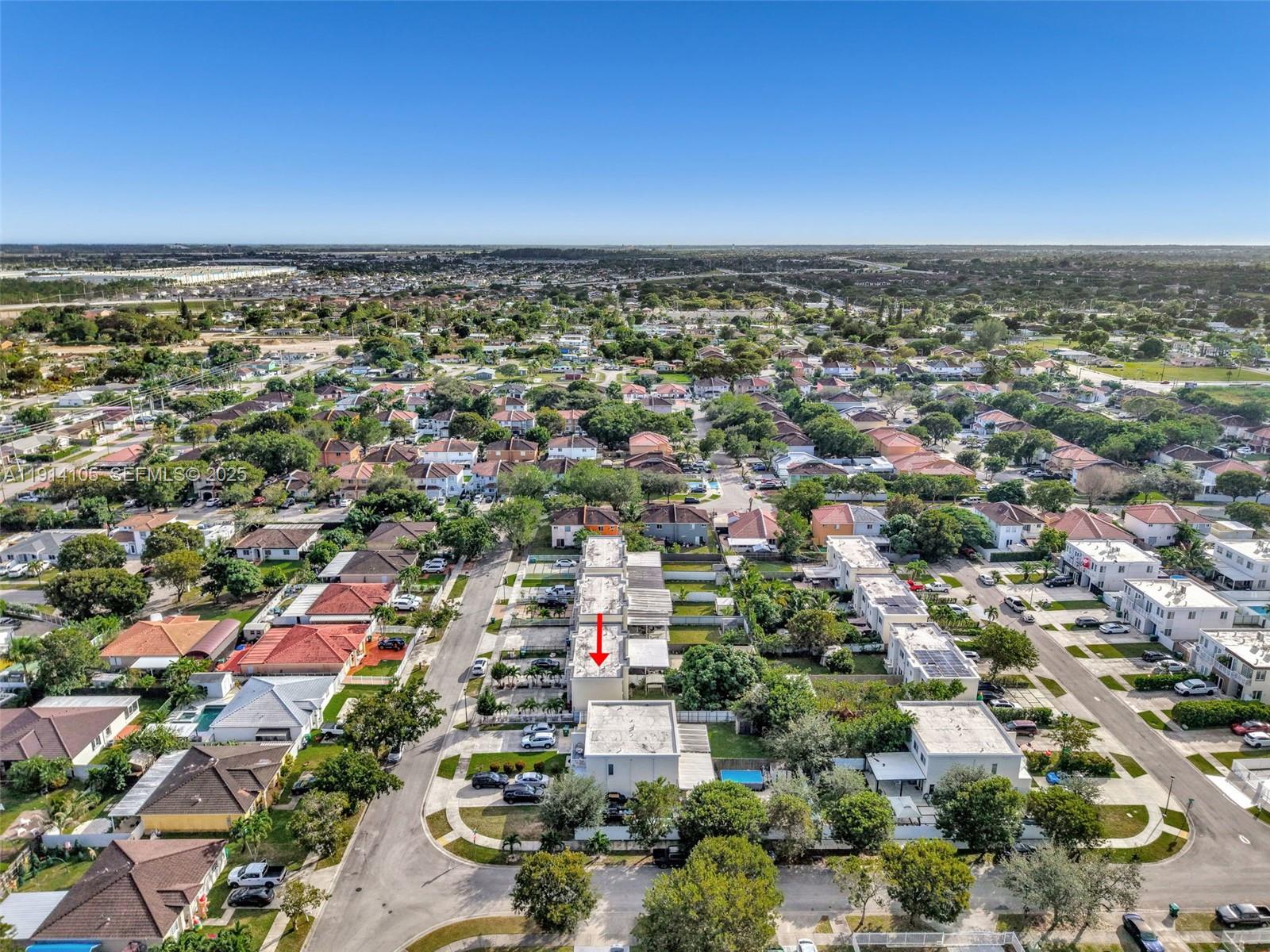 26100 Southwest 134th Place Homestead, FL 33032 - Photo 36 of 39 an aerial view of residential building and city view