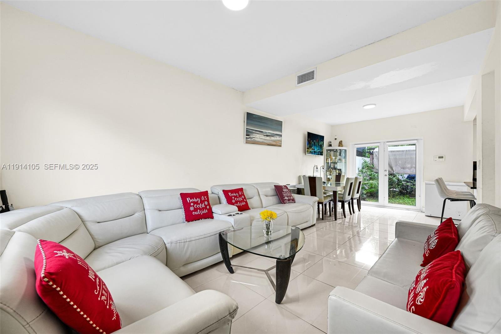 26100 Southwest 134th Place Homestead, FL 33032 - Photo 5 of 39 a living room with furniture and white walls