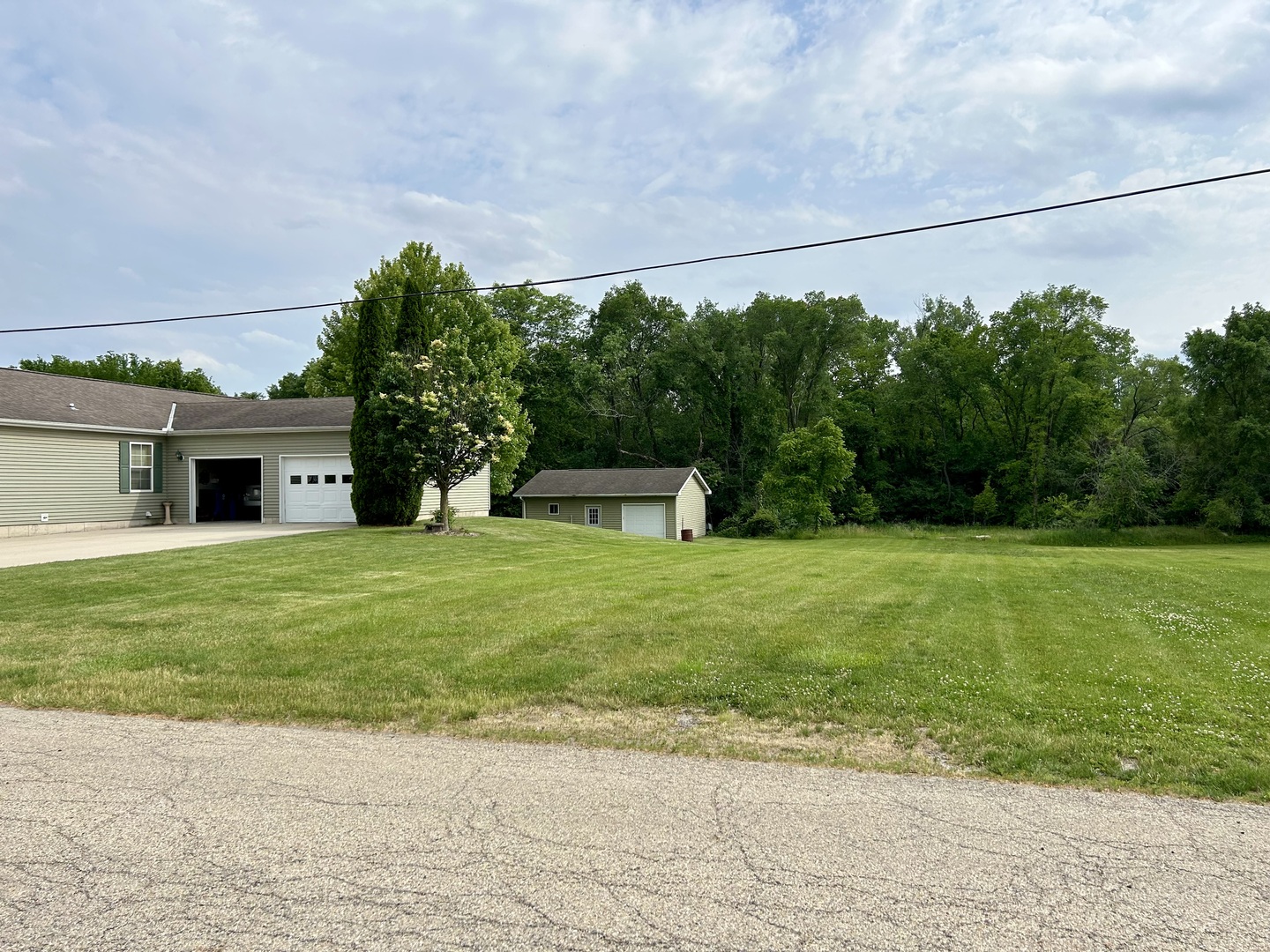 511 West Washington Street Utica, IL 61373 - Photo 2 of 4 a front view of a house with a yard