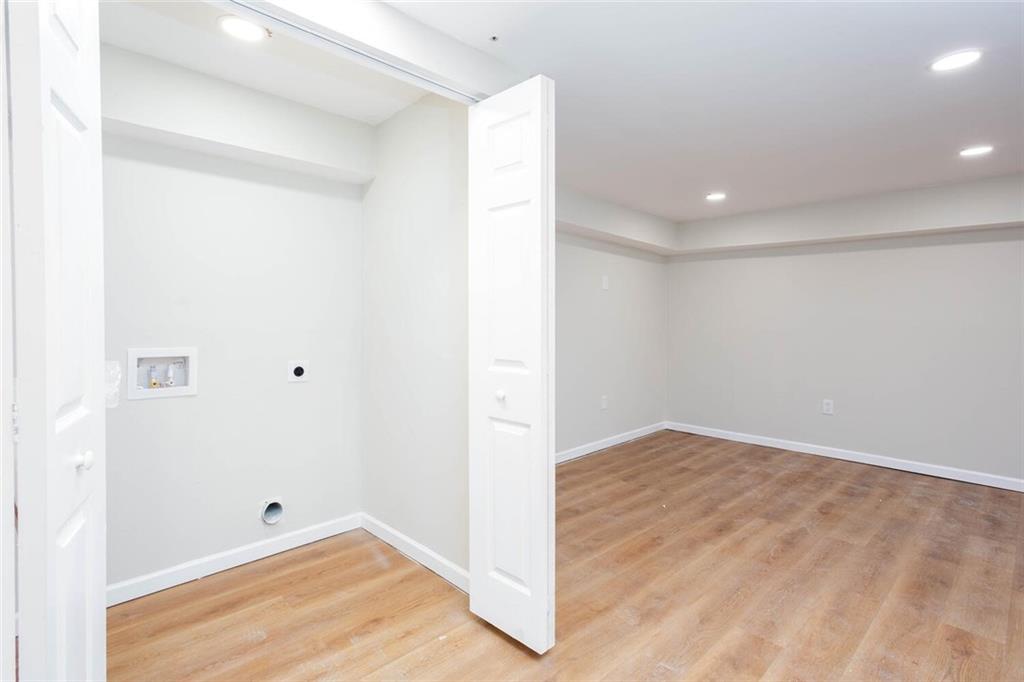 2131 Glendale Drive Decatur, GA 30032 - Photo 12 of 26 an empty room with wooden floor