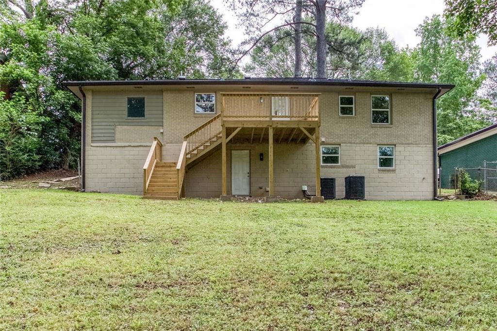 2131 Glendale Drive Decatur, GA 30032 - Photo 25 of 26 a house with trees in the background