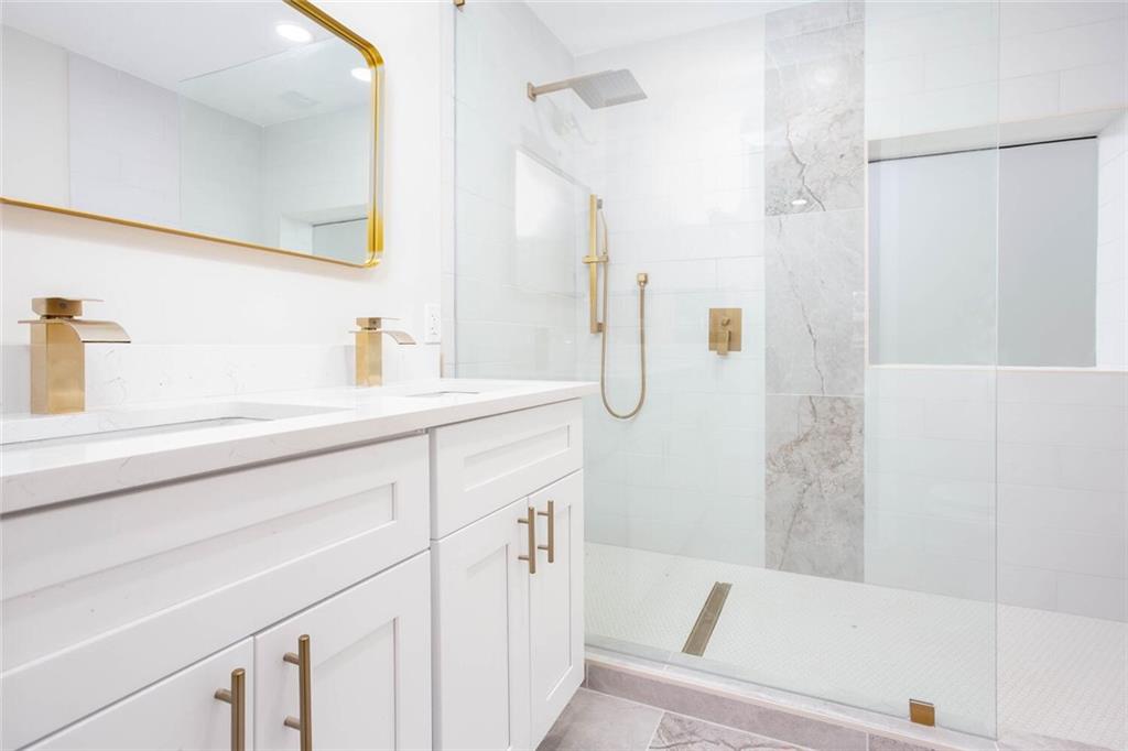 2131 Glendale Drive Decatur, GA 30032 - Photo 6 of 26 a bathroom with a bathtub and a sink