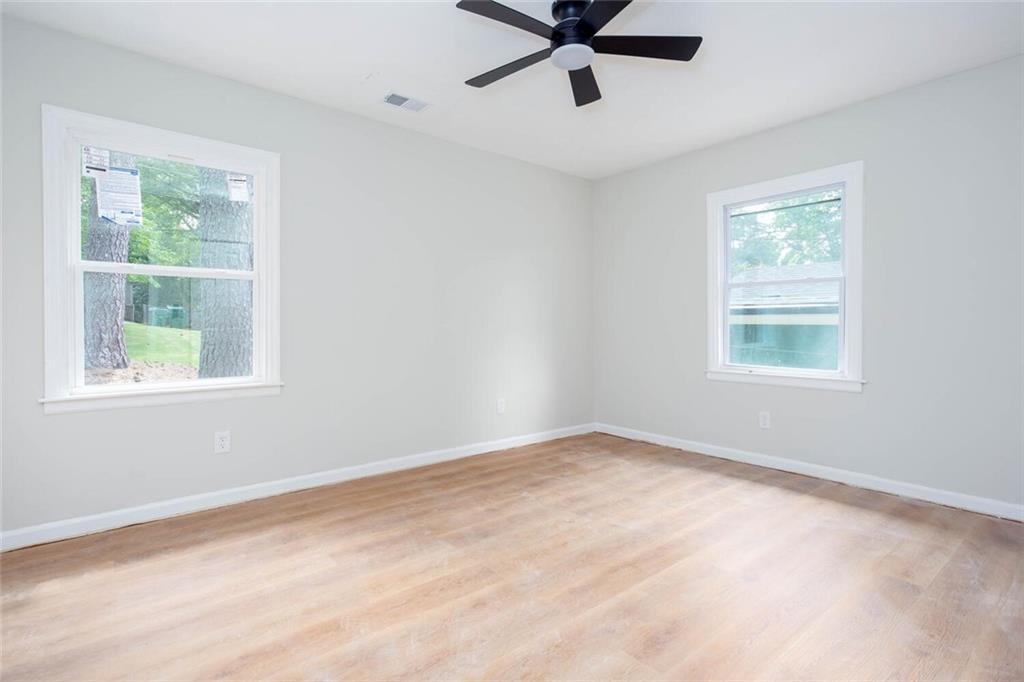 2131 Glendale Drive Decatur, GA 30032 - Photo 10 of 26 a view of a big room with windows and closet