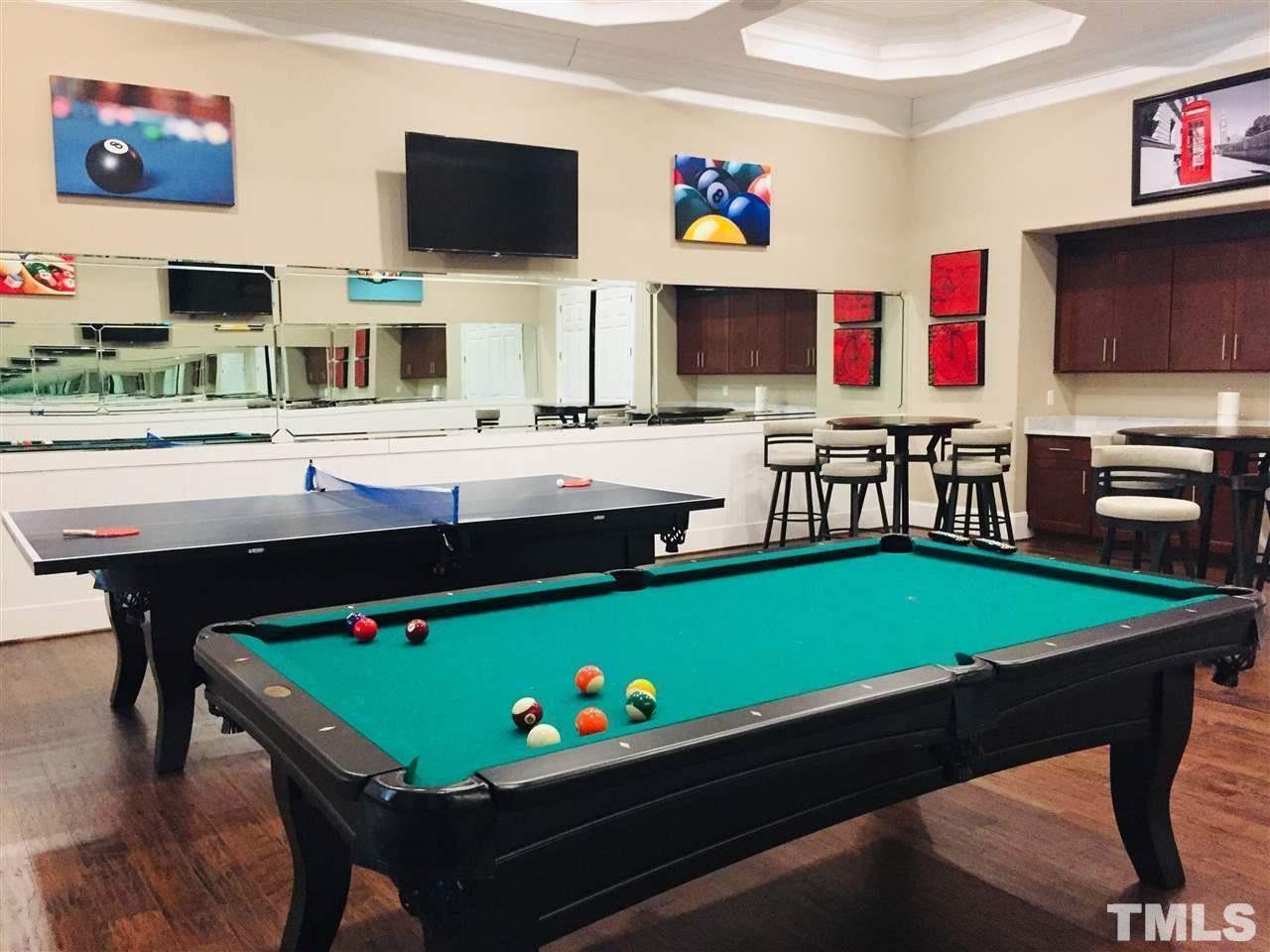 1027 Islip Place Durham, NC 27703 - Photo 13 of 18 a room with furniture pool table and flat screen tv
