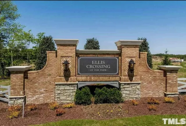 a view of a room with furniture and chandelier