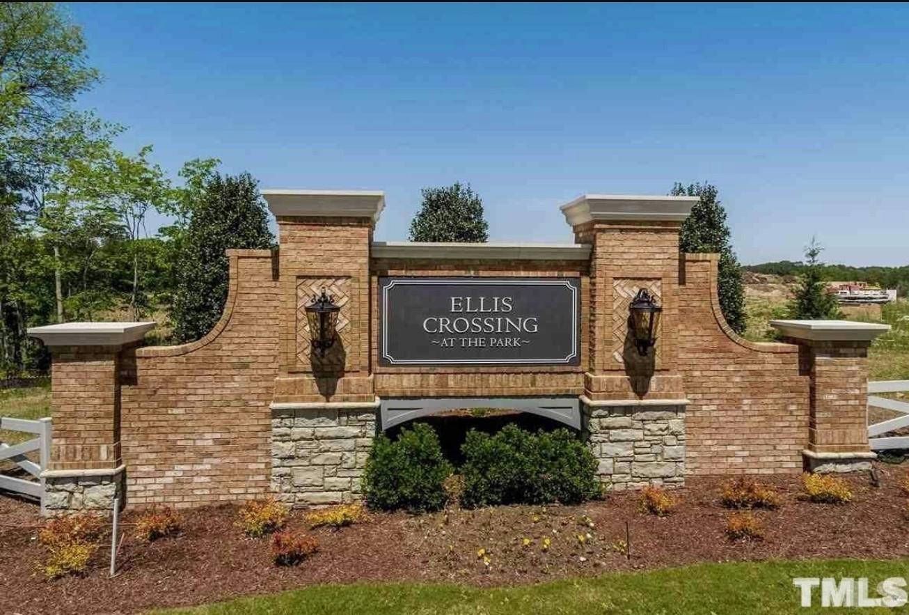 1027 Islip Place Durham, NC 27703 - Photo 6 of 18 a sign on the side of a building