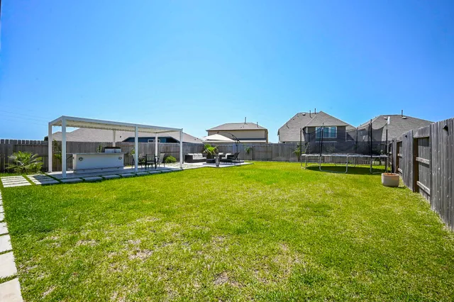 a front view of house with yard and seating area